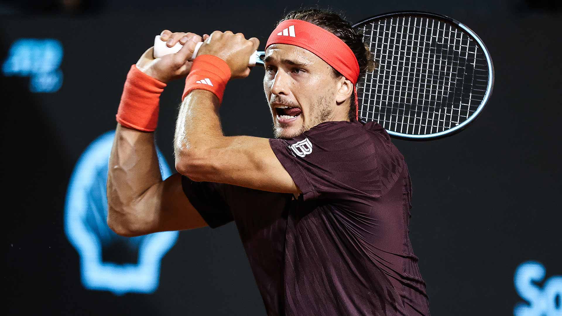 Alexander Zverev saves a set point in the opener en route to a first-round win in Rio.